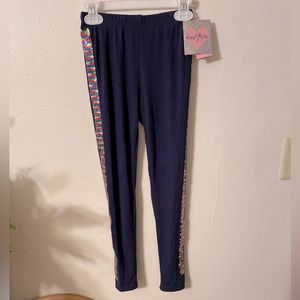 Girls 2 pack of long knit pants, size 8.  Navy blue. The other pair is burgundy